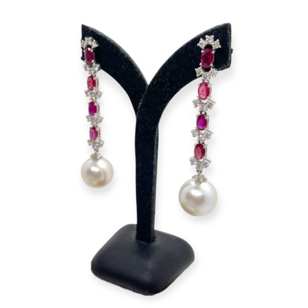 Red ruby, white diamond, and pearl earrings set in 18k gold