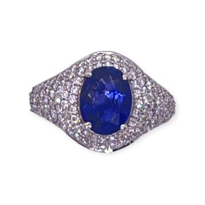 Blue sapphire and diamond ring in gold iced out