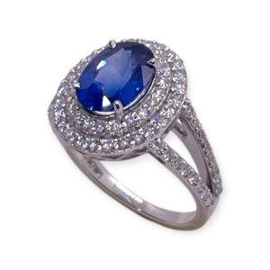 Blue sapphire and diamond ring in white gold