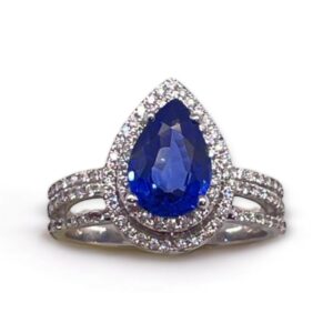 Pear shape sapphire and diamond double cluster ring in white gold, Oms milano, Harsh Khandelwal Jewellery