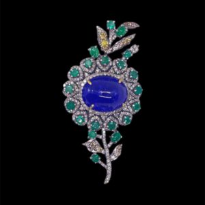 Flower motif Tanzanite, Emerald and Diamonds brooch in Silver | A13572