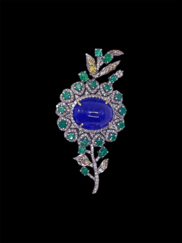 Flower motif Tanzanite, Emerald and Diamonds brooch in Silver | A13572